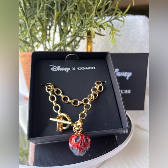 Coach Jewelry - Coach x Disney Poison Apple Charm Gold Bracelet NWT